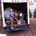 junk removal truck filled with junk