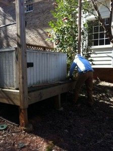 This is a junk hot tub in the back of a Marietta Home