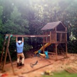 ross hanging from play set