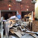 pile of construction debris on driveway