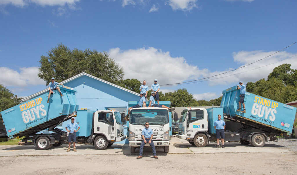 Stand Up Guys team with junk removal trucks